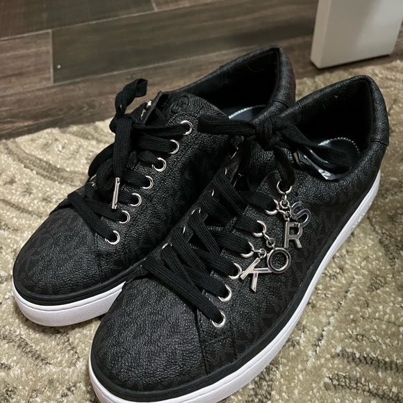 Michael Kors Black Sneakers with Lace-Up Design and Comfortable Fit - Picture 1 of 8